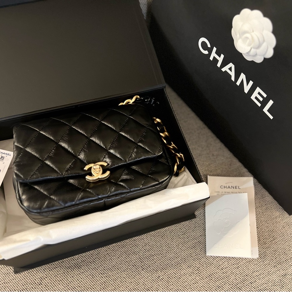 Chanel small black flap handbag